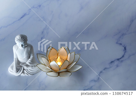 Vesak Buddha birthday. Buddha statue and lotus lamp creating peaceful atmosphere 138674517