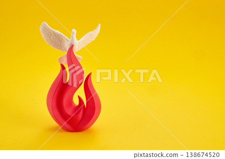 Holy spirit dove with Pentecost fire flame on yellow background 138674520