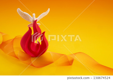 Pentecost. Holy spirit dove with flame and orange ribbon 138674524