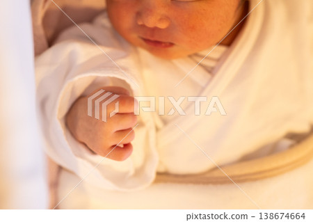 Baby sleeping in a cot Baby sleeping in a cot 138674664