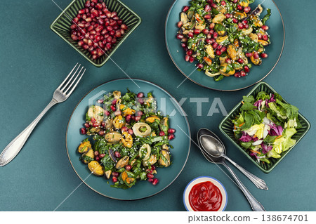 Warm seafood salad with shrimp mussels squid and greens Warm seafood salad with shrimp mussels squid and greens 138674701