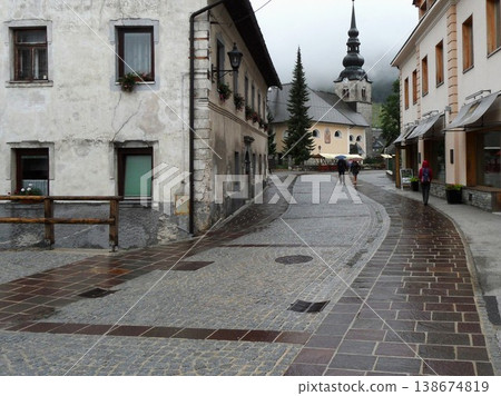 Kranska Gora, a rainy cobblestone path Kranska Gora, a rainy cobblestone path 138674819