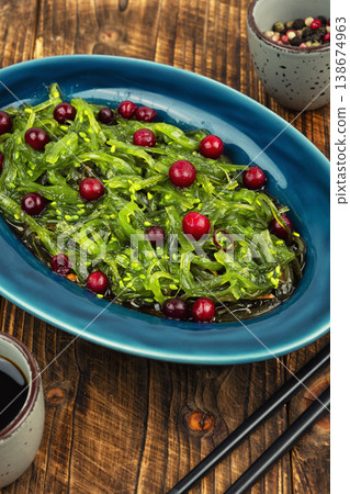 Fresh seaweed salad with cranberries, clean eating concept. Fresh seaweed salad with cranberries, clean eating concept. 138674963