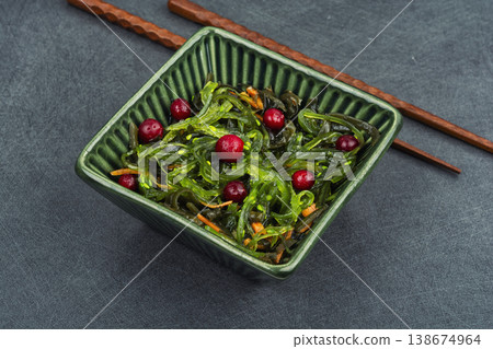 Seaweed and cranberry salad, modern healthy cuisine. Seaweed and cranberry salad, modern healthy cuisine. 138674964