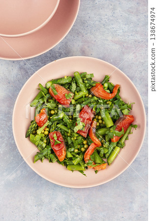 Healthy fish salad with smoked trout and asparagus. 138674974