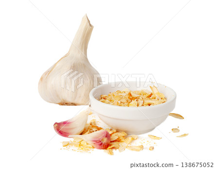 Dry Garlic Slices, Crispy Fried Cloves Pile Closeup, Roasted Grilled Garlic Flakes, Clove Chip Group Dry Garlic Slices, Crispy Fried Cloves Pile Closeup, Roasted Grilled Garlic Flakes, Clove Chip Group 138675052