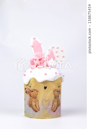 Easter Kulich Decorated with Pink Bunny Ears and Marshmallow Topper 138675454
