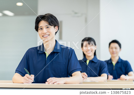 Young care workers undergoing training. Filming assistance provided by Denpa Gakuen Educational Corporation, Tokyo Electronics College. 138675823