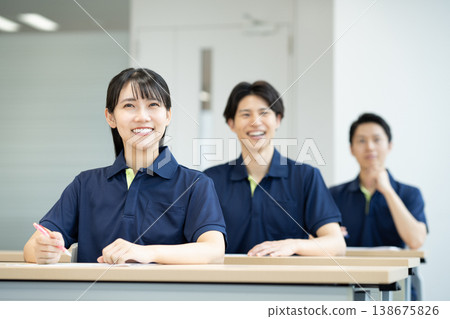 Young care workers undergoing training. Filming assistance provided by Denpa Gakuen Educational Corporation, Tokyo Electronics College. 138675826