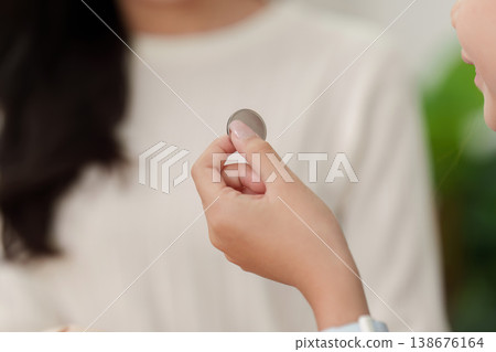 Child holding coin for saving education Child holding coin for saving education 138676164