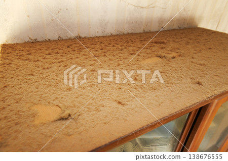 Dust on the top of the cupboard Dust on the top of the cupboard 138676555