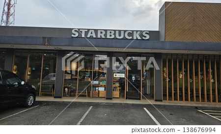this is Starbucks store and logo this is Starbucks store and logo 138676994