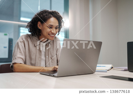 Black Woman Guides Students Remotely. Supportive Instructor Provides Virtual Lessons And Encouragement 138677618
