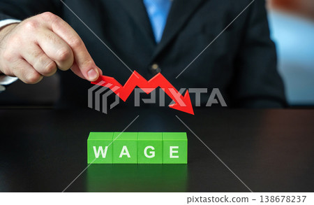Blocks with the word Wage and a red downward arrow. 138678237