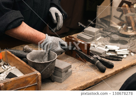 Artisan working at craft table during festival in Berlin 138678278