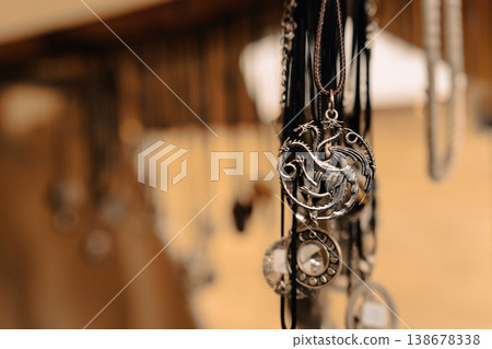 Dragon pendant at Easter Knight Festival market stall in Berlin 138678338