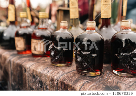 Skull-shaped bottles at festival market stall in Berlin 138678339