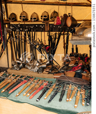 Medieval weapons and helmets at market stall in Berlin 138678351