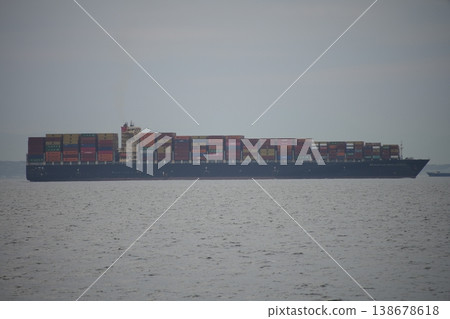 Container ship sailing through Tokyo Bay Container ship sailing through Tokyo Bay 138678618