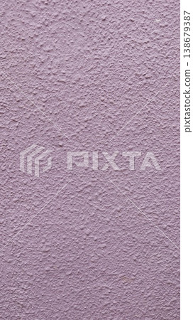 vertical photo of close up of a cement wall paint in violet colour as wallpaper or background 138679387