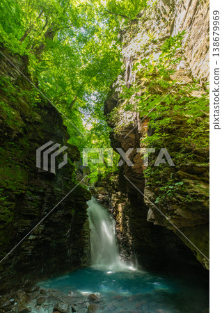 The lush greenery of Sukkanzawa and the Yuhi Waterfall 138679969