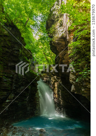 The lush greenery of Sukkanzawa and the Yuhi Waterfall The lush greenery of Sukkanzawa and the Yuhi Waterfall 138679970