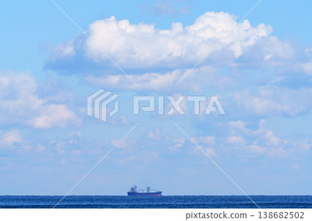 A landscape of ships floating on the sky and sea, with the horizon stretching out before you. A landscape of ships floating on the sky and sea, with the horizon stretching out before you. 138682502