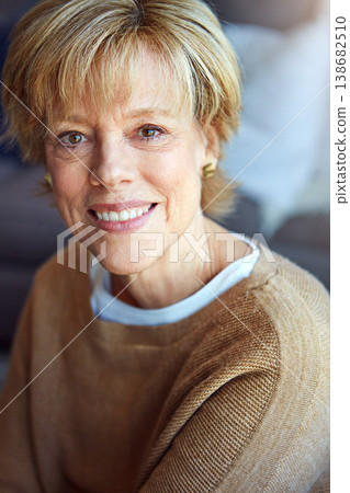 Portrait, mature or happy woman in apartment to relax with freedom on living room sofa or couch. Home, face or senior lady with smile, peace or wellness in retirement or house for a resting break Portrait, mature or happy woman in apartment to relax with freedom on living room sofa or couch. Home, face or senior lady with smile, peace or wellness in retirement or house for a resting break 138682510