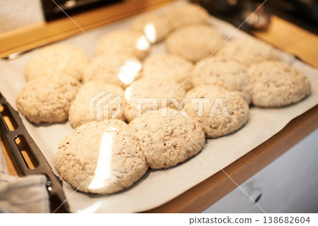 Closeup, tray and bread in an oven from a bakery for diet, nutrition and eating pastry food. Zoom, health and carbs, pita or loaves of rolls on a shelf for baking, cooking or lunch at a restaurant 138682604