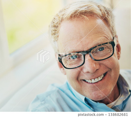 Portrait, glasses or happy mature man in house living room to relax with care on sofa for resting break. Apartment, face or senior male person with smile or wellness in retirement, lounge or home 138682681