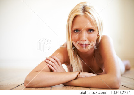 Portrait, relax and happy woman on floor in home in living room to relax. Face, natural beauty or confident blonde girl in house, lounge or apartment with healthy skin, mockup or space in Switzerland 138682735