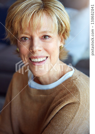 Portrait, mature or happy woman in home with freedom on living room sofa or couch to relax in retirement. Apartment, face or senior lady with smile, peace or wellness in house for a resting break Portrait, mature or happy woman in home with freedom on living room sofa or couch to relax in retirement. Apartment, face or senior lady with smile, peace or wellness in house for a resting break 138682841