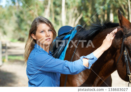 Smile, nature and portrait for woman with her horse on an outdoor farm for sports racing. Grooming, training and confident young female person from Canada with equestrian animal or pet in countryside Smile, nature and portrait for woman with her horse on an outdoor farm for sports racing. Grooming, training and confident young female person from Canada with equestrian animal or pet in countryside 138683027