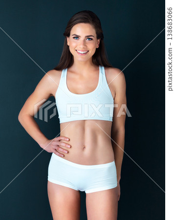 Happy woman, portrait and fitness to lose weight, wellness and health against a studio background. Active female person smile with hand on hip for body workout, exercise or training on mockup space 138683066