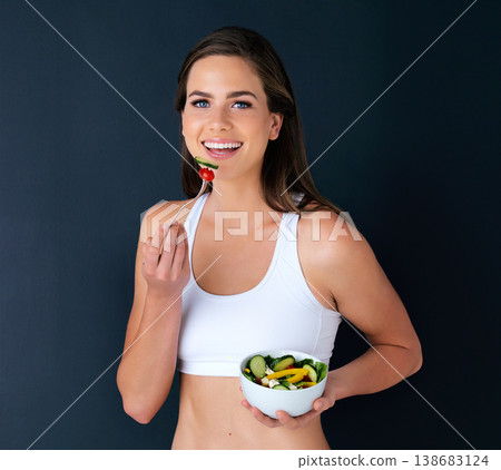 Happy woman, portrait and salad bowl for diet, lose weight or natural nutrition in fitness against a studio background. Female person or model smile with vegetables for food, healthy meal and fiber Happy woman, portrait and salad bowl for diet, lose weight or natural nutrition in fitness against a studio background. Female person or model smile with vegetables for food, healthy meal and fiber 138683124
