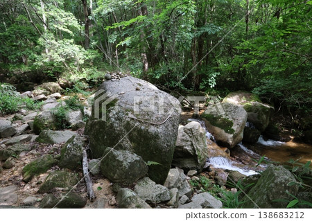 small river in the mountains small river in the mountains 138683212