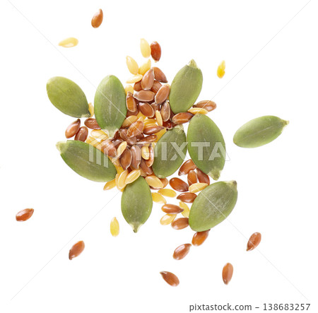 Pumpkin seeds with flax seed mix isolated on white background. Clipping path. Top view. Pumpkin seeds with flax seed mix isolated on white background. Clipping path. Top view. 138683257