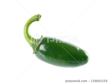 Fresh jalapeno pepper isolated on white background. Slices of green hot serrano pepper. Clipping path. Fresh jalapeno pepper isolated on white background. Slices of green hot serrano pepper. Clipping path. 138683258