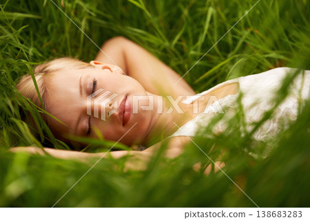 Nature face, grass field and relax woman sleep, tired or leisure for outdoor wellness, calm wellbeing or countryside peace. Girl dream, freedom and park break with green lawn, pitch or garden growth Nature face, grass field and relax woman sleep, tired or leisure for outdoor wellness, calm wellbeing or countryside peace. Girl dream, freedom and park break with green lawn, pitch or garden growth 138683283