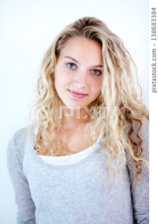 Portrait, woman and natural beauty with wellness and self care, glow or casual fashion in studio. Cosmetic, person and face with smile for glowing skin and facial treatment on white background 138683384