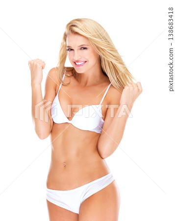 Portrait, winner and success of woman in underwear in studio isolated on a white background. Celebration, happy girl in lingerie and excited for healthy body, fashion promotion and bonus or lottery Portrait, winner and success of woman in underwear in studio isolated on a white background. Celebration, happy girl in lingerie and excited for healthy body, fashion promotion and bonus or lottery 138683418