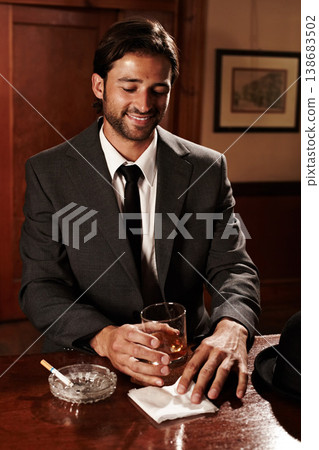 Pub, thinking and man with whiskey, fashion and smile with gentleman, success and relax with cigarette. Person, entrepreneur and guy with alcohol, suit and formal with happiness, tavern and tobacco 138683502