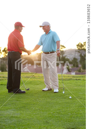 Golf, man and shaking hands with smile on course after game, match or training on field. Mature player, happy and enjoyment of competition handshake with friend for exercise, wellness or challenge Golf, man and shaking hands with smile on course after game, match or training on field. Mature player, happy and enjoyment of competition handshake with friend for exercise, wellness or challenge 138683652