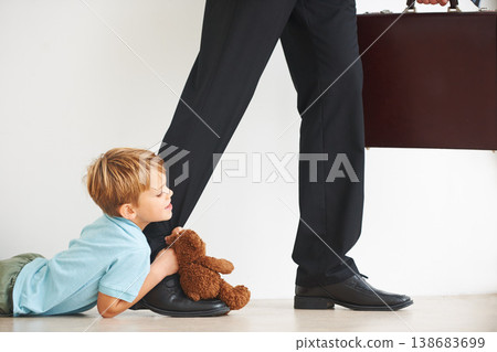Sad, child and businessman to leave for work, tantrum and closeup with anxiety, stress or mental health. Father, kid or begging on floor to stop dad, corporate worker and professional accountant Sad, child and businessman to leave for work, tantrum and closeup with anxiety, stress or mental health. Father, kid or begging on floor to stop dad, corporate worker and professional accountant 138683699