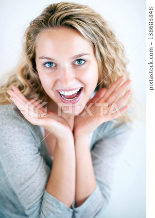 Woman, portrait and hands face for fun play, confidence or attractive smile. Female person, happy emoji gesture and white background for good attitude, carefree or joyful relax personality in Canada Woman, portrait and hands face for fun play, confidence or attractive smile. Female person, happy emoji gesture and white background for good attitude, carefree or joyful relax personality in Canada 138683848