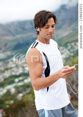 Fitness, man and listening to music on run, smile and laughing for funny podcast, audio and sound. Happy male athlete, earphones and hearing a song, inspirational playlist for workout or exercise 138683853