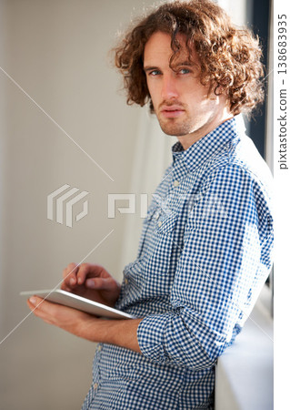 Tablet, portrait and business man typing, scroll or surfing internet for website research, online company data or review. Web analytics, entrepreneur and professional person search agency database 138683935