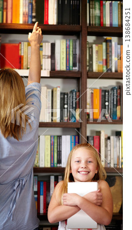 Portrait, books and child in library with excited smile, learning and relax with study knowledge. Storytelling, happy mom and girl in bookstore together with story, fantasy and education in reading. 138684251