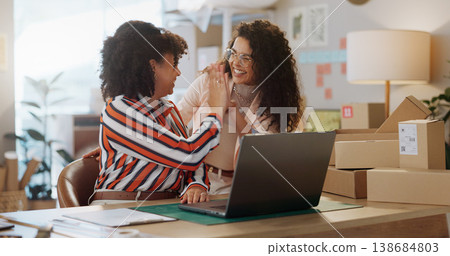 Happy woman, team and high five with laptop in small business success, fashion design or logistics at boutique. Female person touching hands in teamwork for achievement, sale or promo at retail store 138684803
