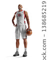Basketball. Full length studio shot of an athletic basketball player in a confident stance holding a ball, isolated on white background 138685219